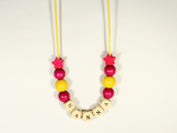 Houten kralenketting Fuchsia & Geel - WauwPauw